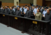 China condena a muerte a tres dirigían red estafas telefónicas