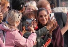Enrique y Meghan reciben vítores